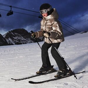 Zara Gold and Black Quilted Puffer Jacket for Cold Weather